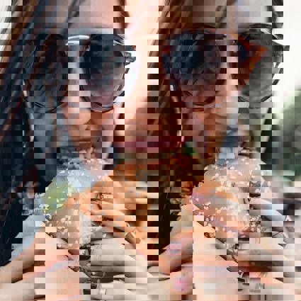 Person eating a burger