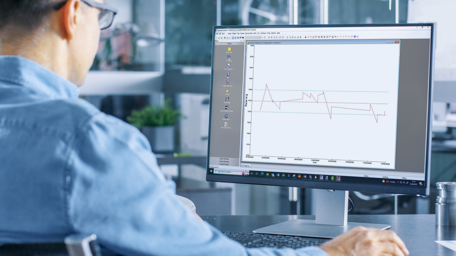 Texture Analyser User Looking At Graph On Screen Using The Trend Viewer