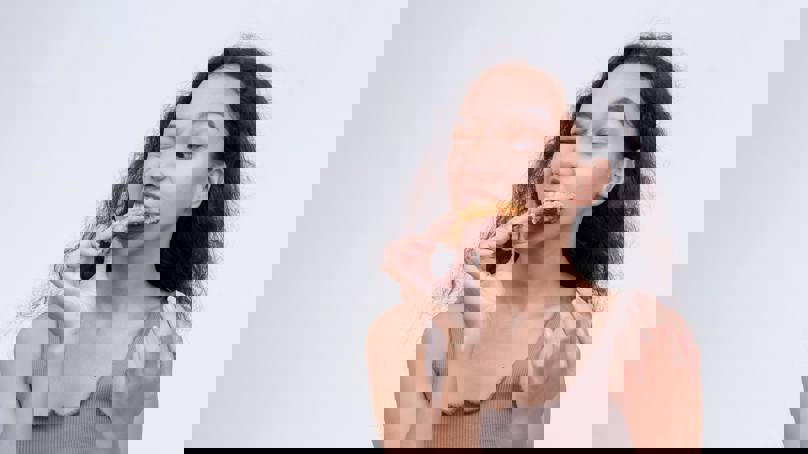 Person Eating Tough Meat