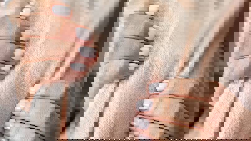 Person Holding Soft Woollen Material