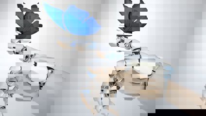 Blue Butterfly Sitting On Robotic Hand