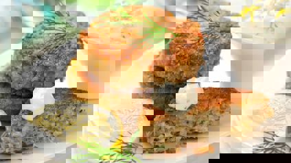 Fish Cakes Served With Lemon And Yoghurt Dressing