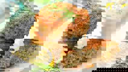 Fish Cakes Served With Lemon And Yoghurt Dressing