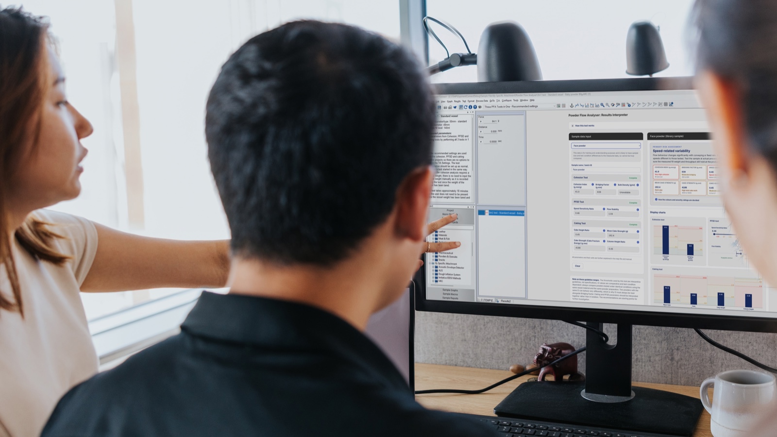 People looking at the PFA Interpreter results on a screen