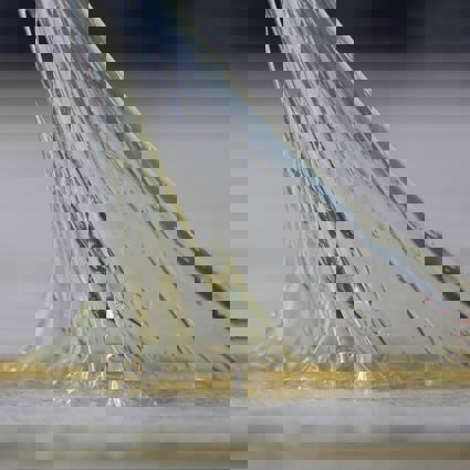 Adhesive substance stretching between two surfaces