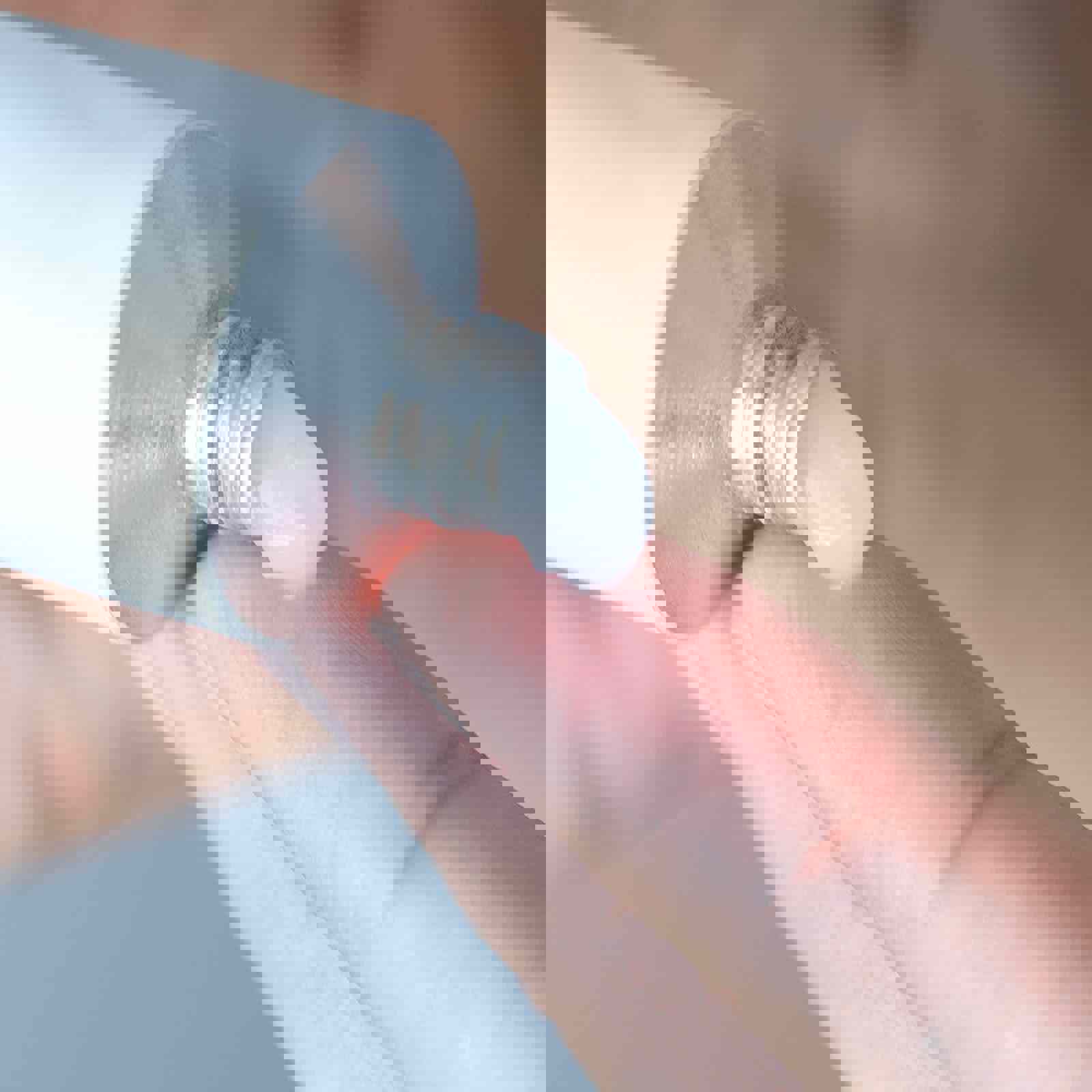 Person squeezing cream from a tube