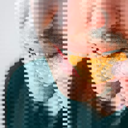 Person eating a crisp