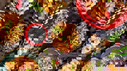 Table Filled With Delicious Asian Dishes