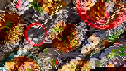 Table Filled With Delicious Asian Dishes