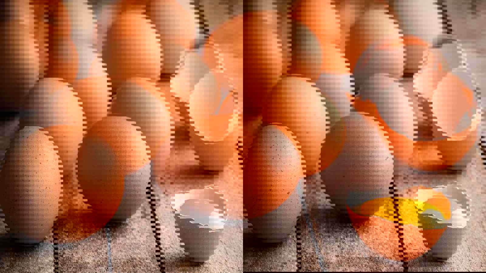 Brown Eggs, Some Cracked With Yolk Exposed