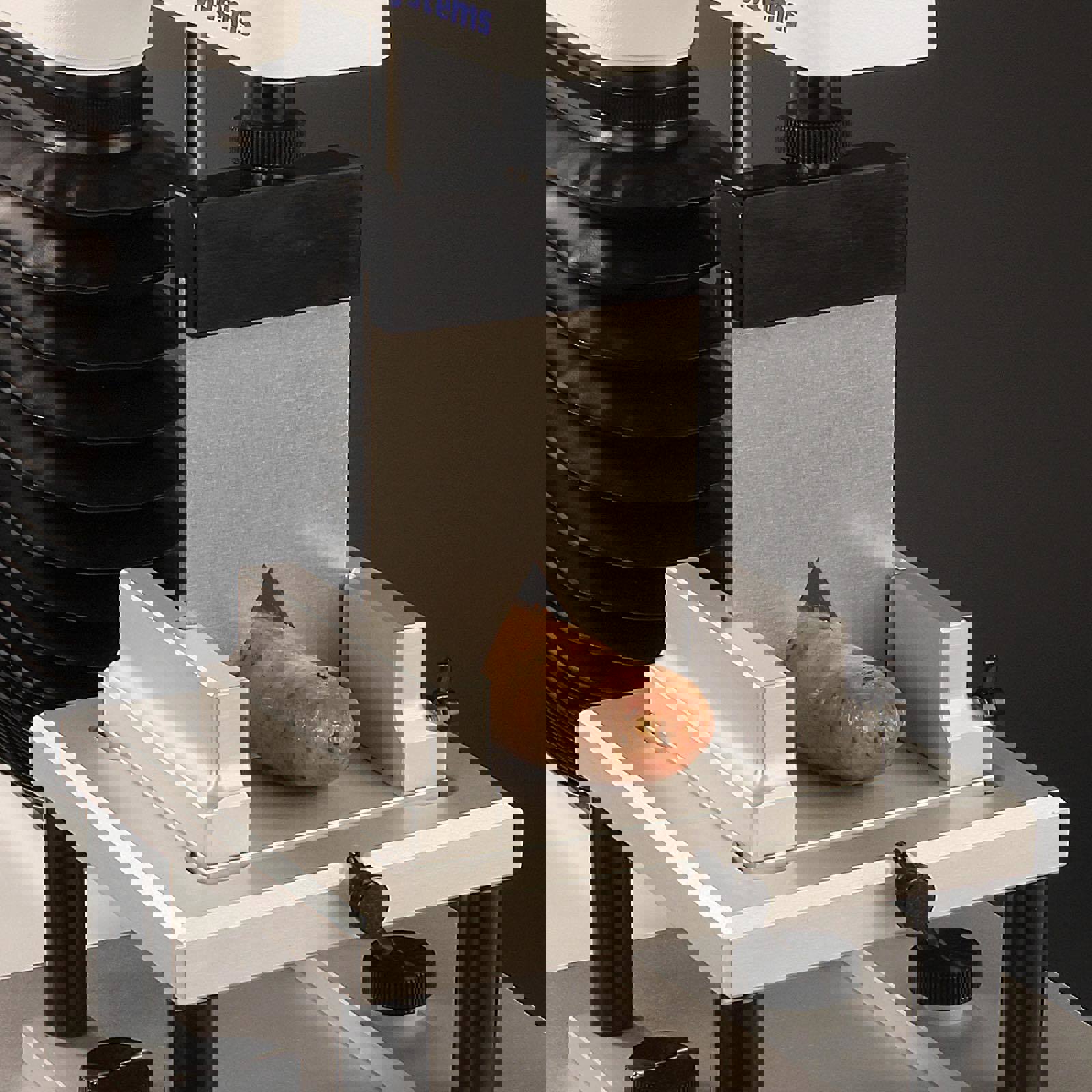 Blade Set attached to Texture Analyser performing test on a sausage