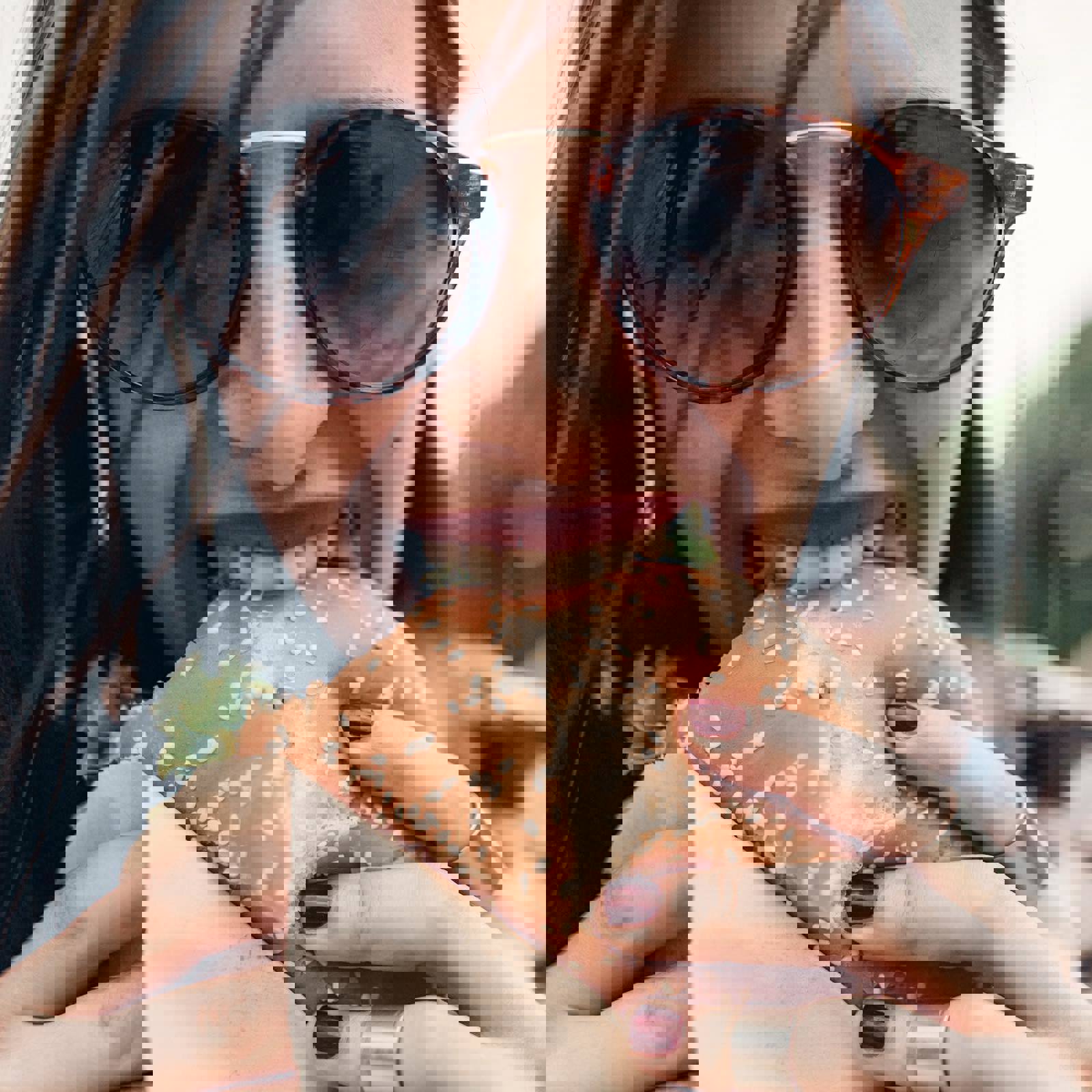 Woman eating a burger