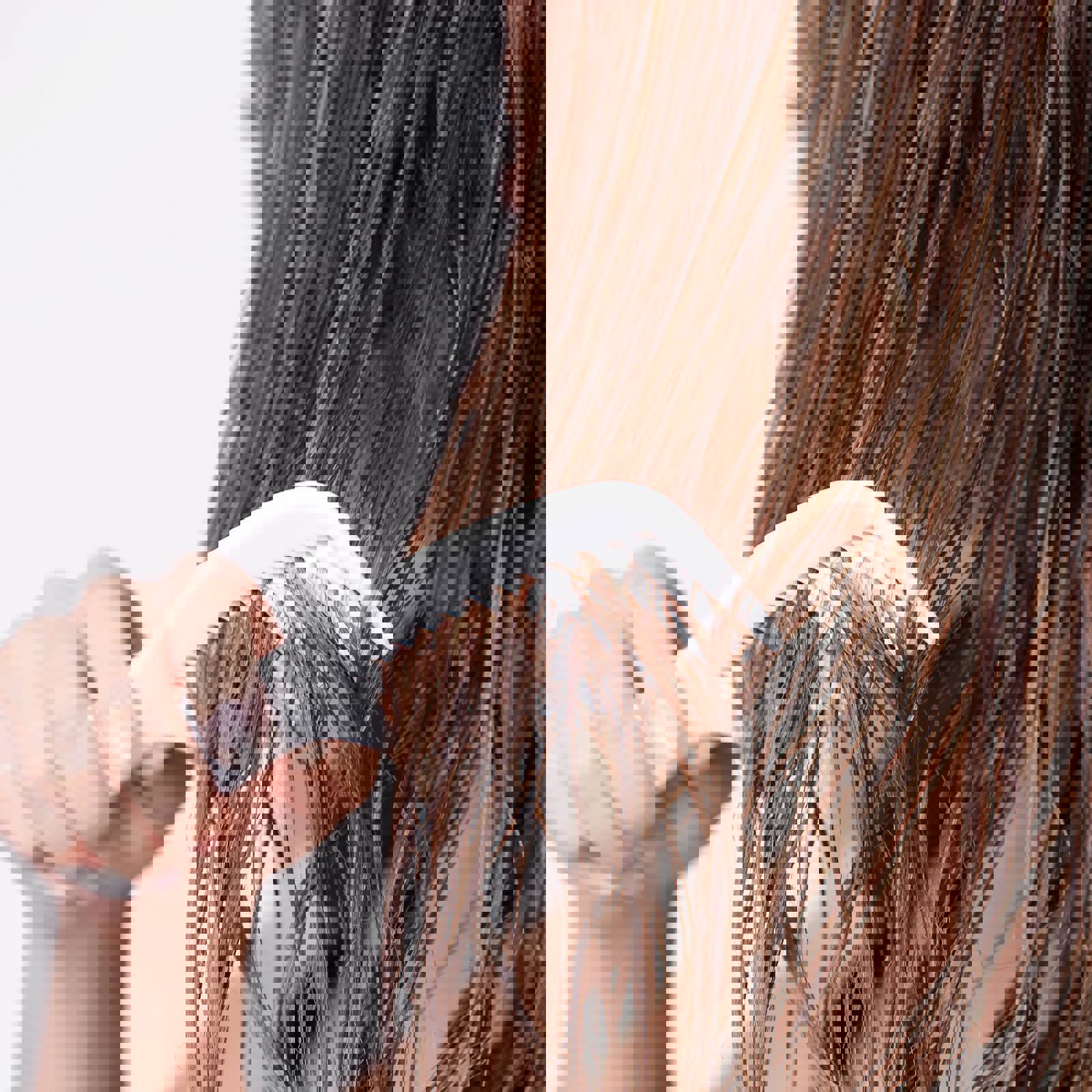 Person combing their hair