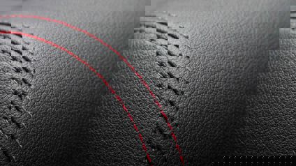 Close Up Of Stitching On Leather