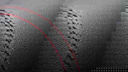 Close Up Of Stitching On Leather