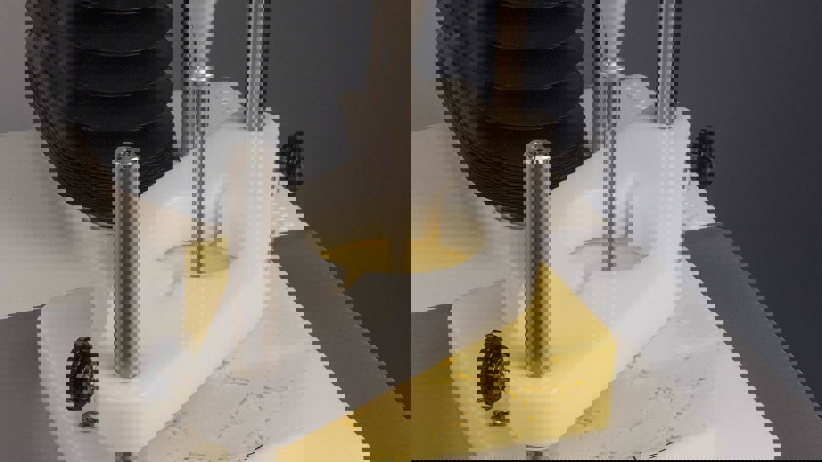 Universal Sample Clamp attached to Texture Analyser testing block of cheese