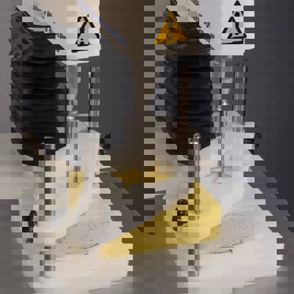 Universal Sample Clamp and block of cheese