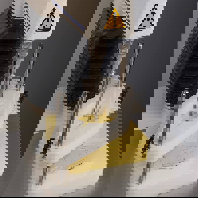 Universal Sample Clamp and block of cheese