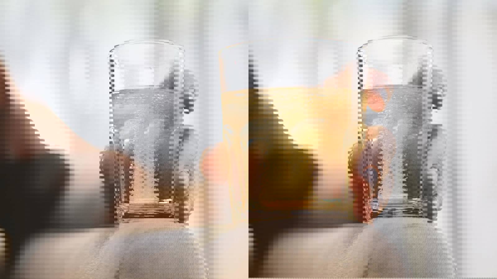 Tablet dissolving in glass