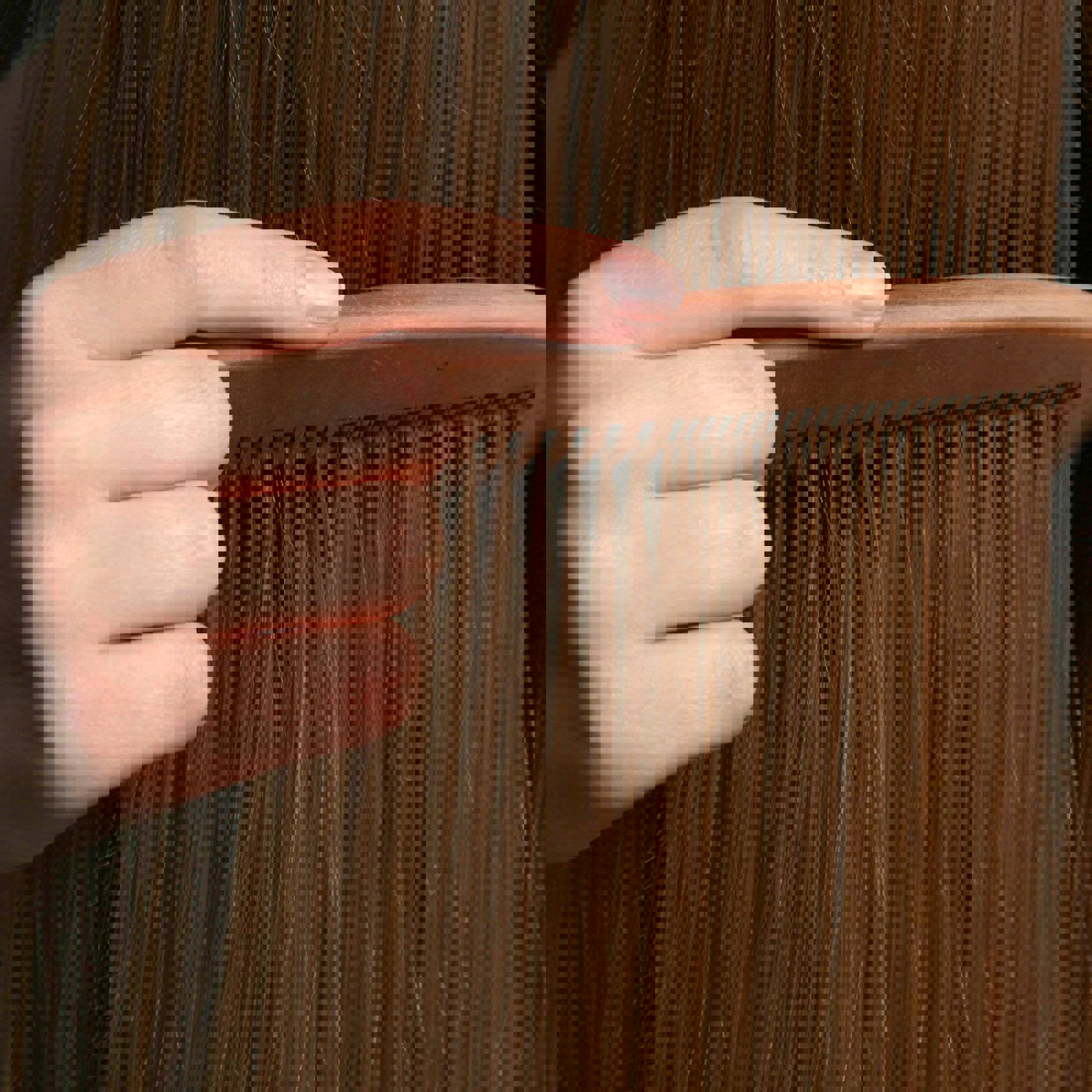 Person combing dry hair