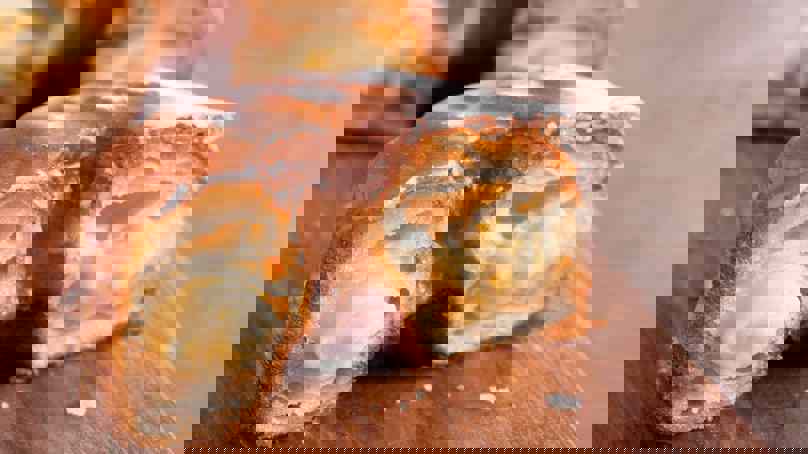 Custard Filled Cronut Cut In Half