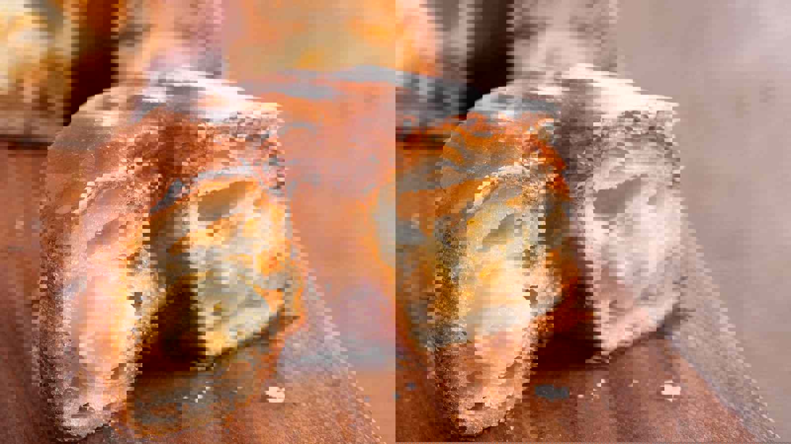 Custard filled cronut cut in half