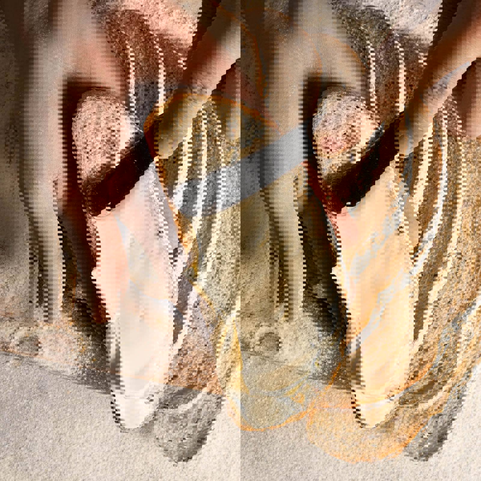 Spreading butter on to slice of bread