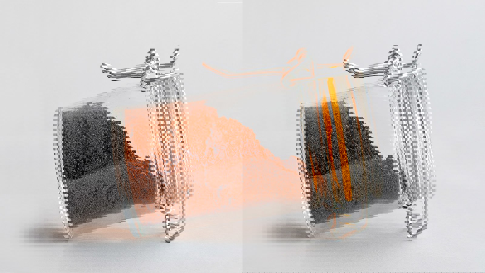 Example of caked and consolidated spice in a glass jar 