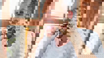 Person Flossing Teeth