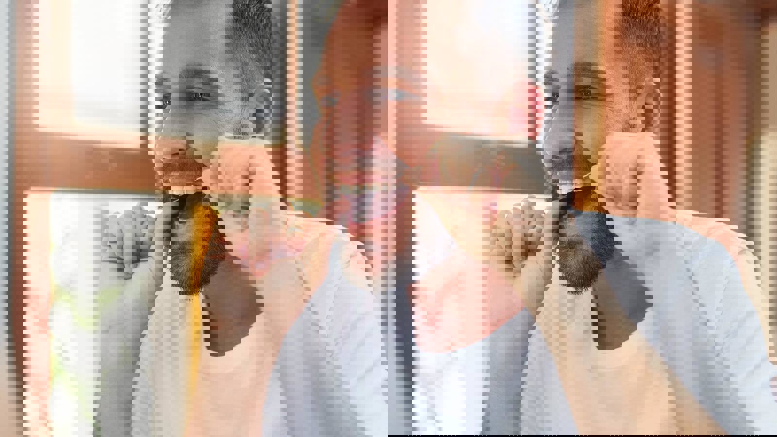 Person flossing teeth