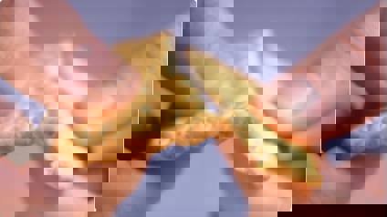 Cracker Being Snapped In Half