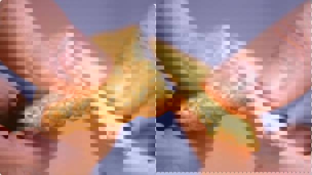 Cracker Being Snapped In Half