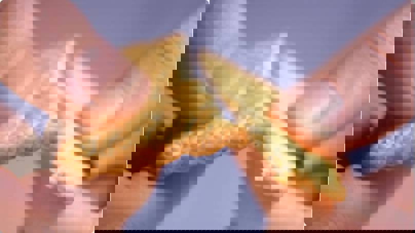 Cracker Being Snapped In Half